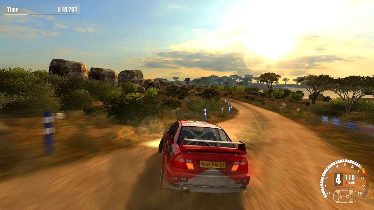 Rush Rally 3で車の後ろから未舗装のコースを見る場面