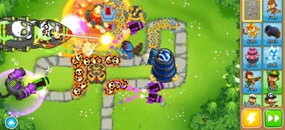 Bloons TD 6でモンキーを配置して風船を迎撃する場面